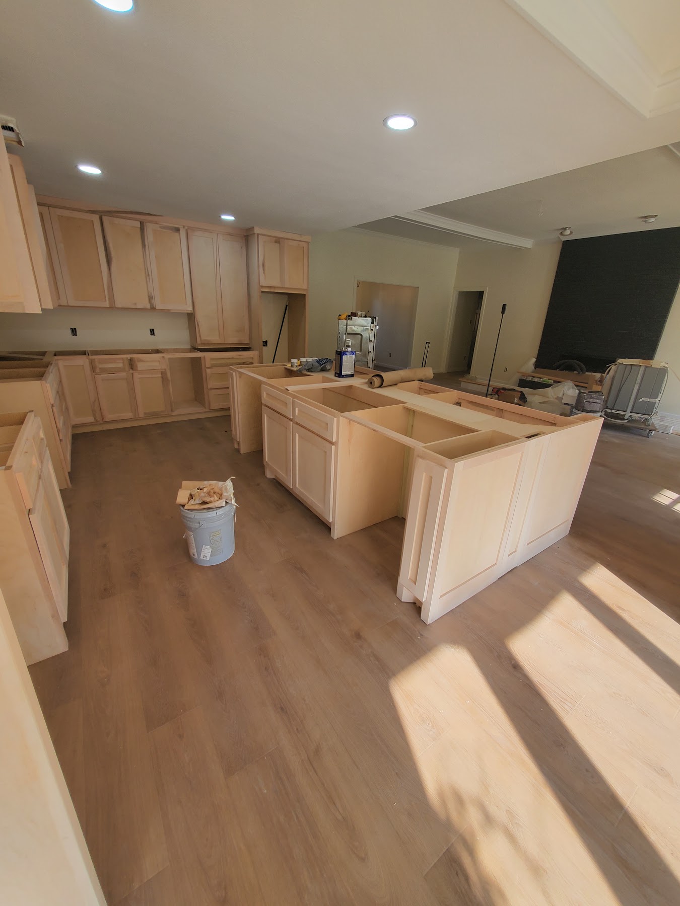 New kitchen cabinetry and flooring during installation