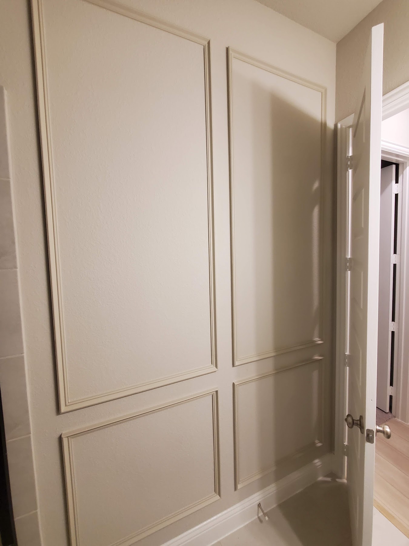 Completed wall paneling and custom trim work