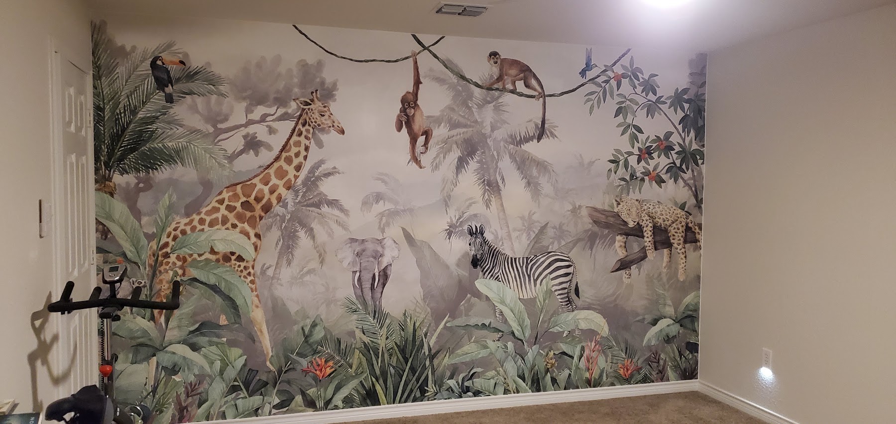 Completed feature wall with custom wallpaper mural